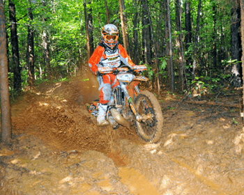 Shane Watts grinding in mud.